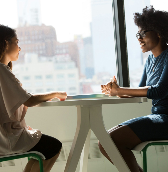 People talking at a table